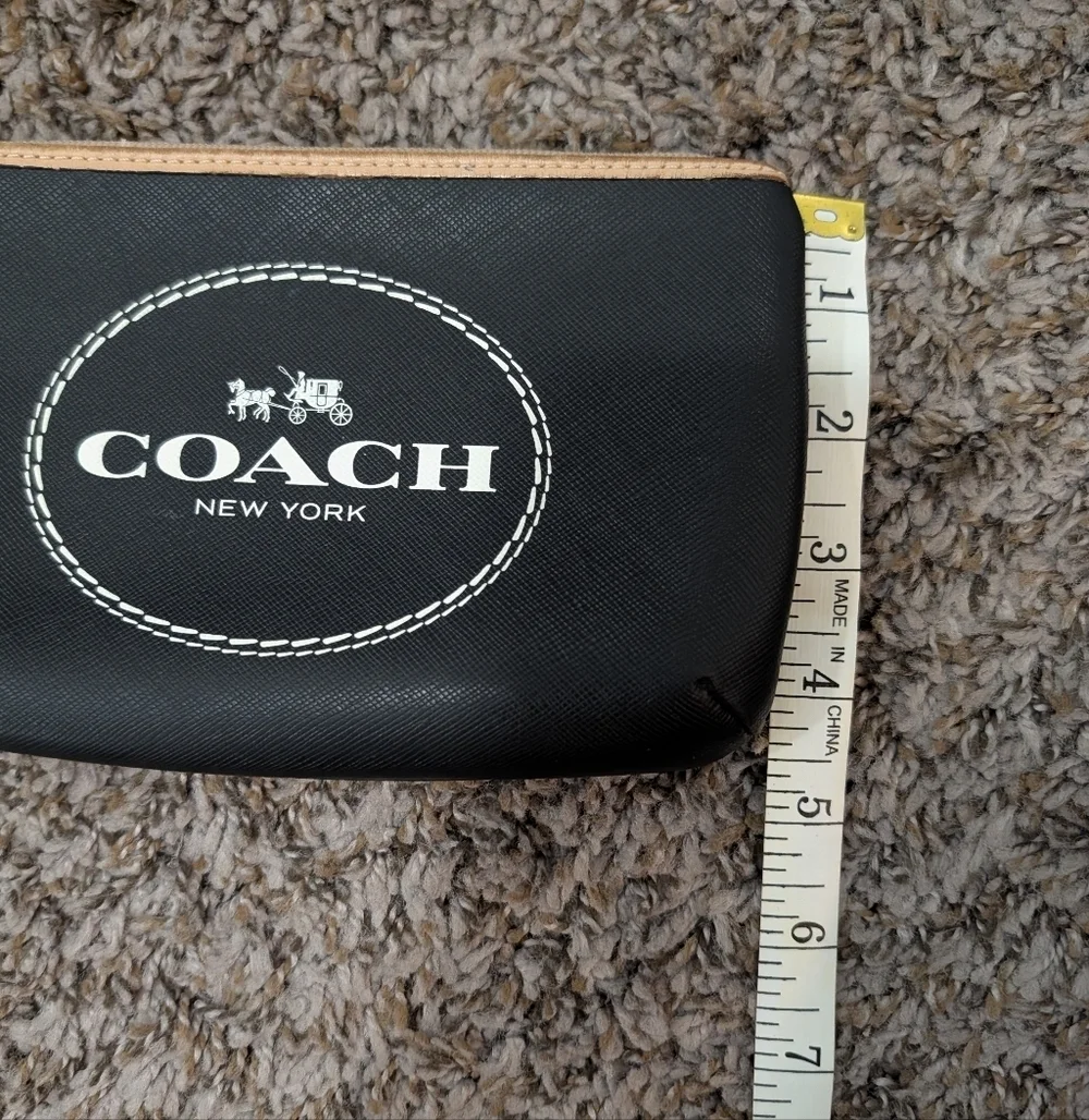 Coach Black and Tan Wristlet with Red Tag